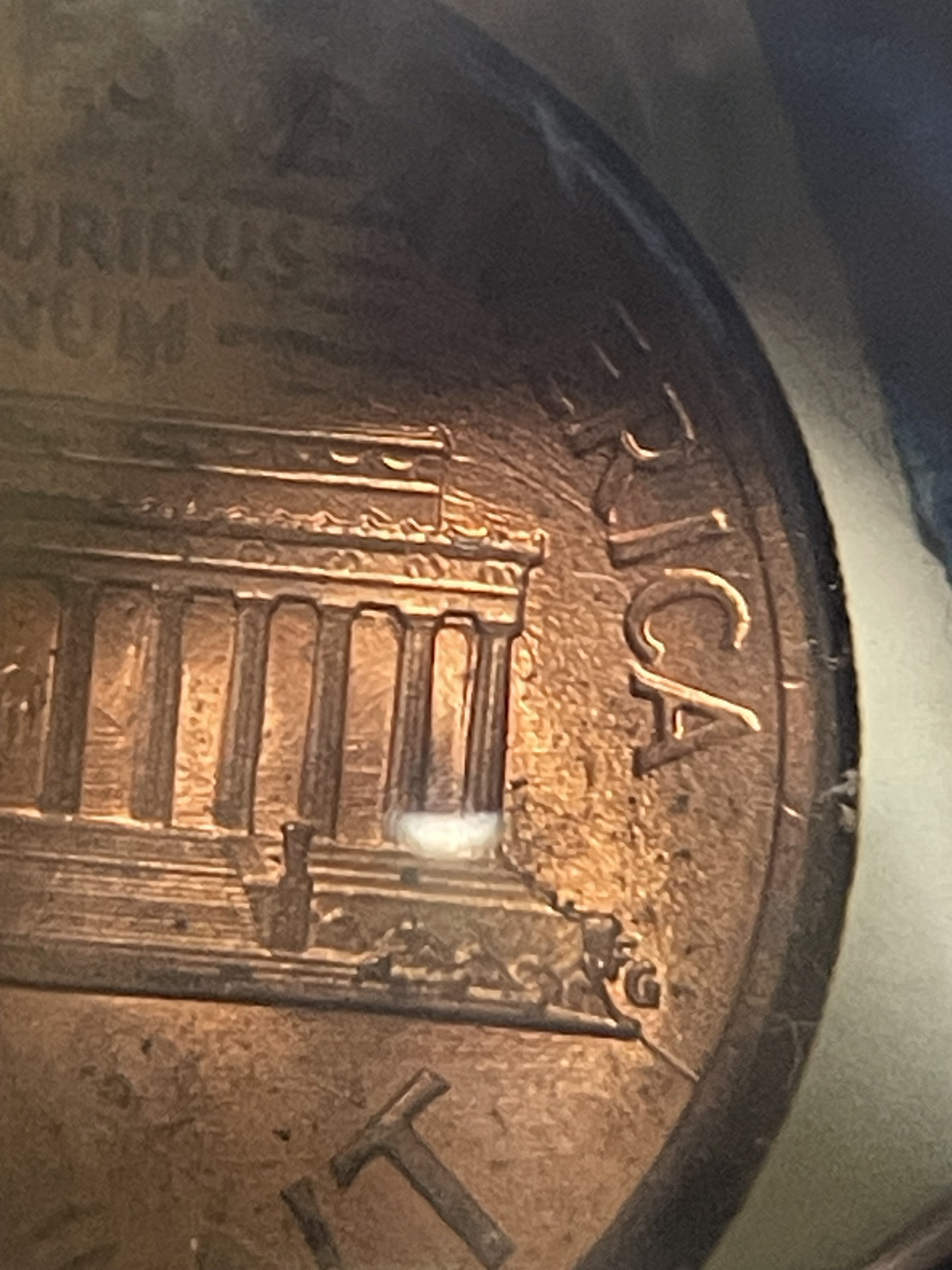 Genuine 1989-P cent die crack closeup showing metal flow characteristics