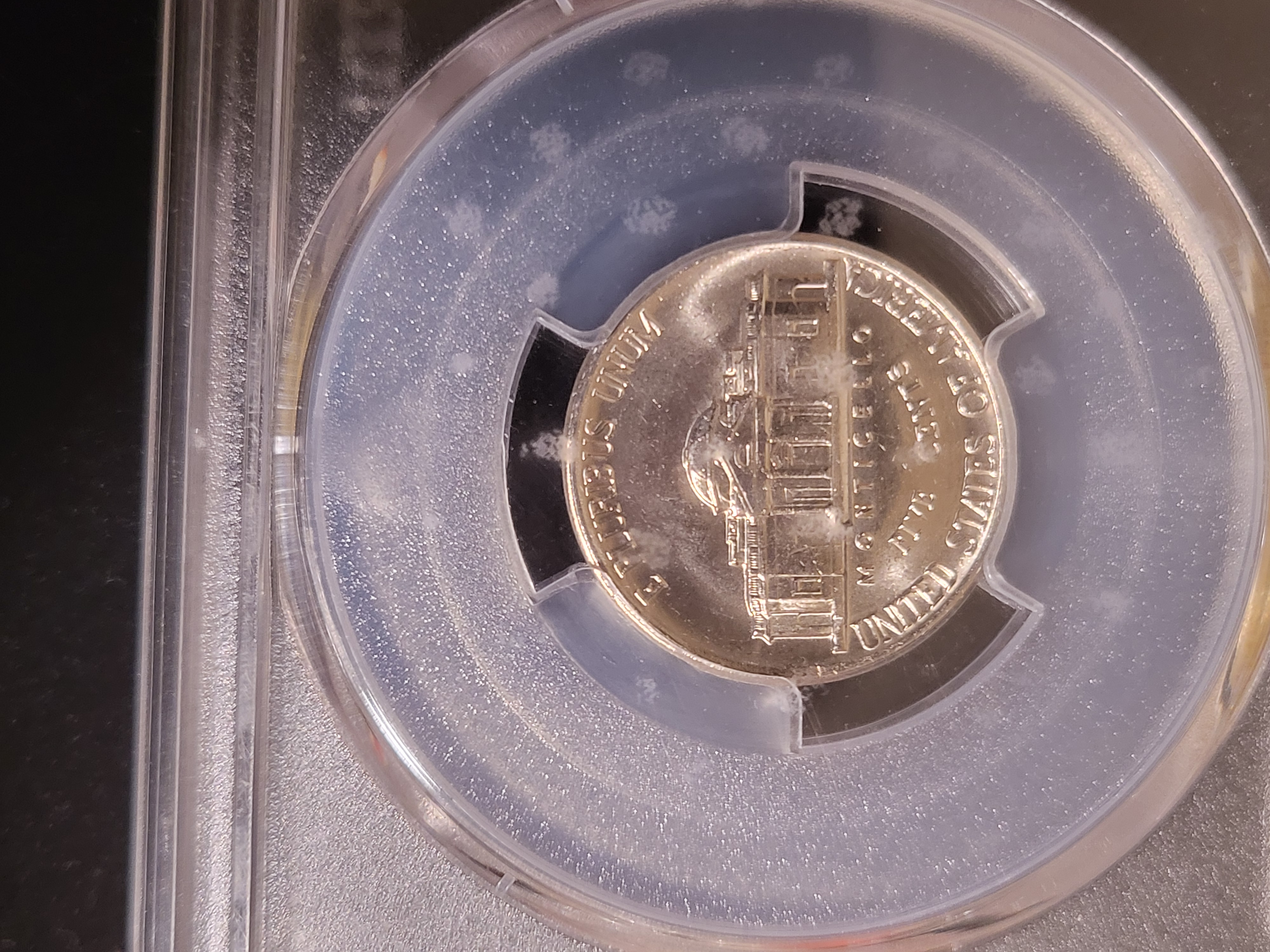 PCGS slab damage from toolbox liner